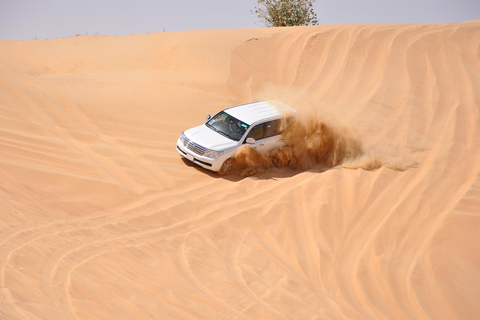 Doha: Safari nel deserto con quad, sandboard e giro in cammelloTour condiviso