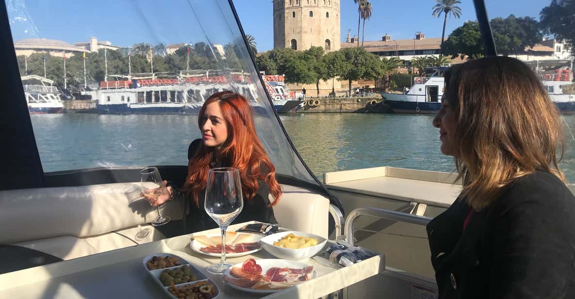 Seville: Exclusive River Boat Tour with Tapas