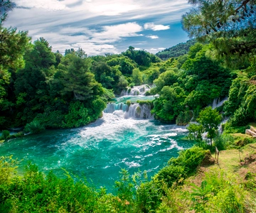 De Split: Excursão às cascatas de Krka com passeio de barco e natação