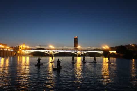 Seville: Sunset and Evening Paddle Boarding Tour