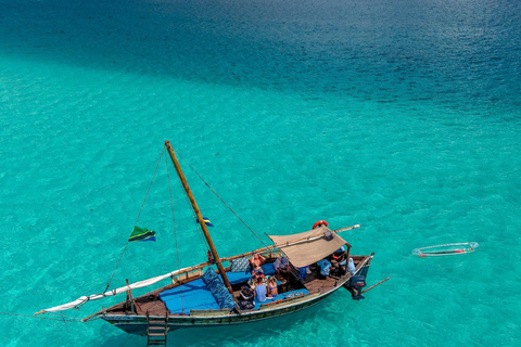 Mnemba Island Dhow Snorkeling, Dolphins, Bbq Lunch, Sailing Sharing Mnemba Island Snorkeling Trip with Bbq Lunch