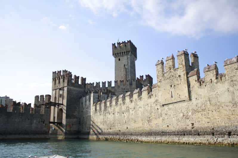 Sirmione: Scenic Afternoon Boat Cruise with Prosecco & Snack | GetYourGuide