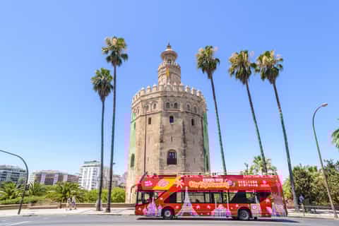Red hop-on hop-off sightseeing bus in Seville