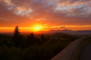 Cos: traslado en autobús de ida y vuelta al monte Zia para ver la puesta de sol