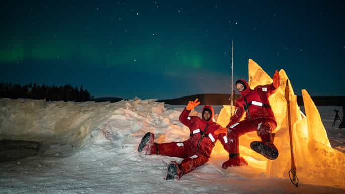 ice floating in lapland with northern lights