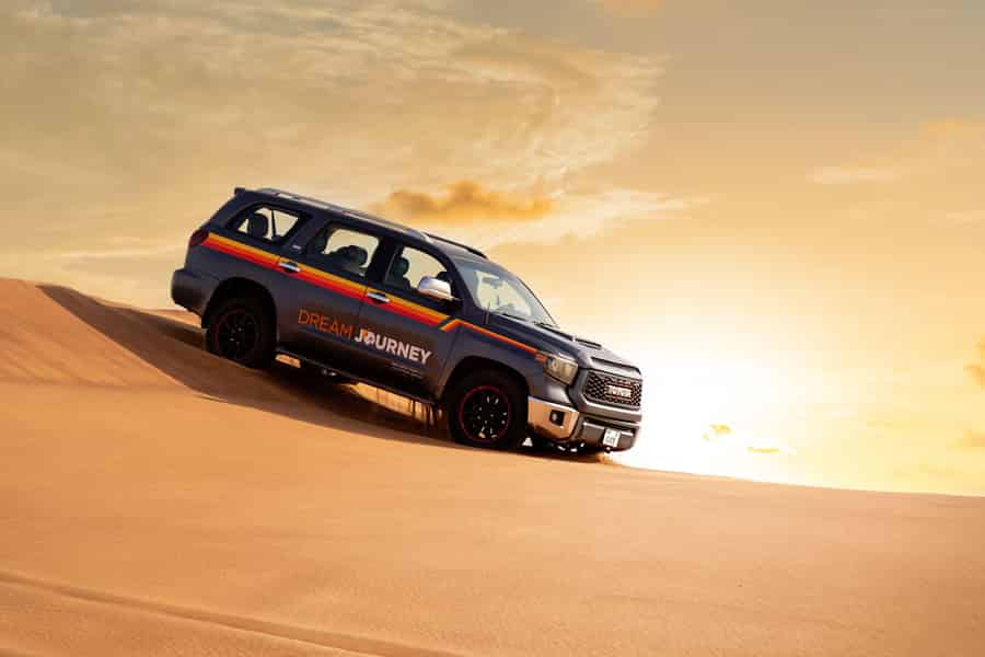 Dubai Wüstenentdeckung: Rote Dünen Safari, Sandboard & Kamele