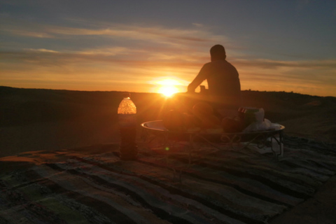 Ksar Ghilane : chameau, baignade, dunes et coucher de soleil