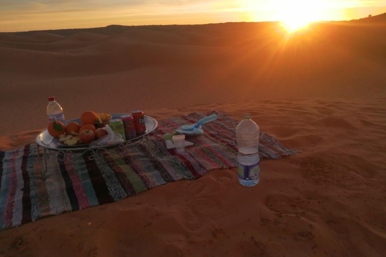 Ksar Ghilane : chameau, baignade, dunes et coucher de soleil