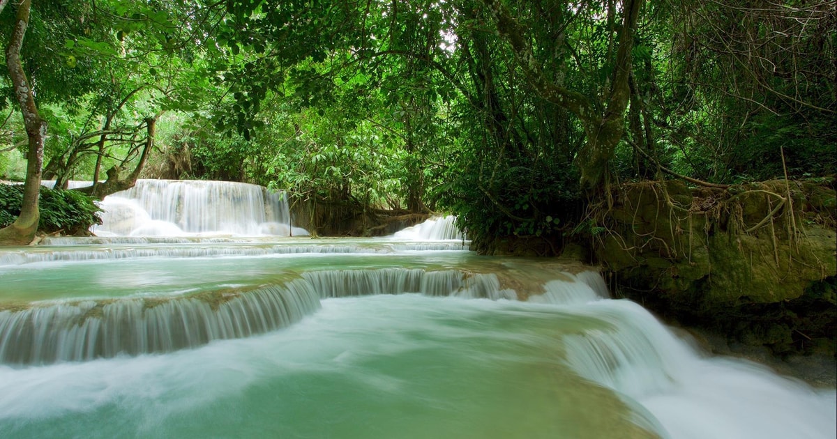 Luang Prabang: Kuang Si Bike Ride & Long-Tail Boat Cruise | GetYourGuide