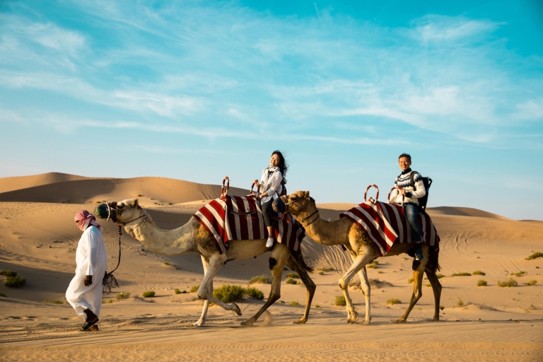 Abu Dhabi: Desert Safari with BBQ, Camel Ride & Sandboarding Shared Tour