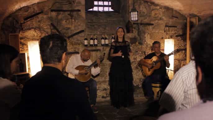 porto live fado show with glass of port wine