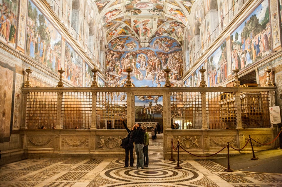 Marvel at Michelangelo's fresco "The Creation of Adam" in the Sistine Chapel