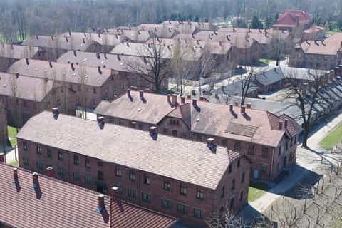 From Krakow: Auschwitz-Birkenau Transportation and Entrance