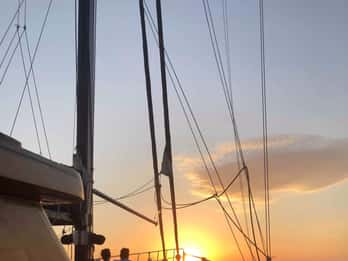 Mykonos: Sunset Boat Cruise with Light Dinner & Drinks