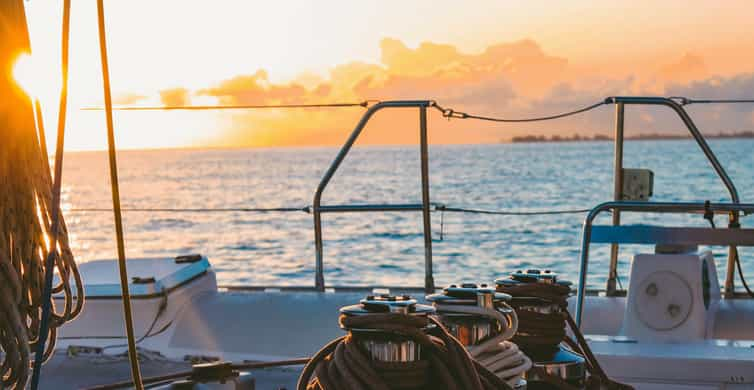 malaga sunset sailing catamaran trip with glass of cava