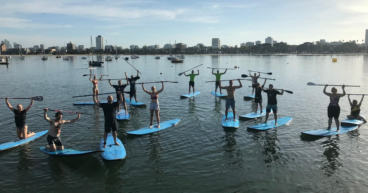 St Kilda Group Lesson for StandUp Paddleboarding GetYourGuide