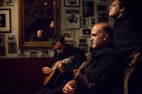 Coimbra, live fado -show met glas Port Wine - Housity