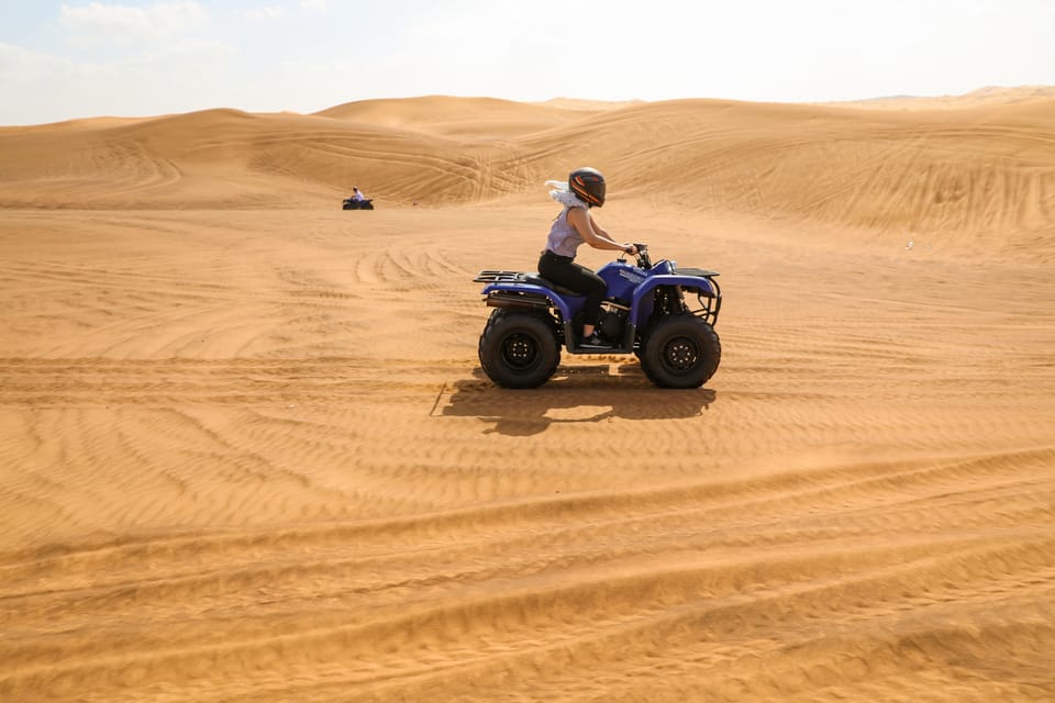 Dubai: Adventure Quad Bike Safari, Camel Ride & Refreshments | GetYourGuide