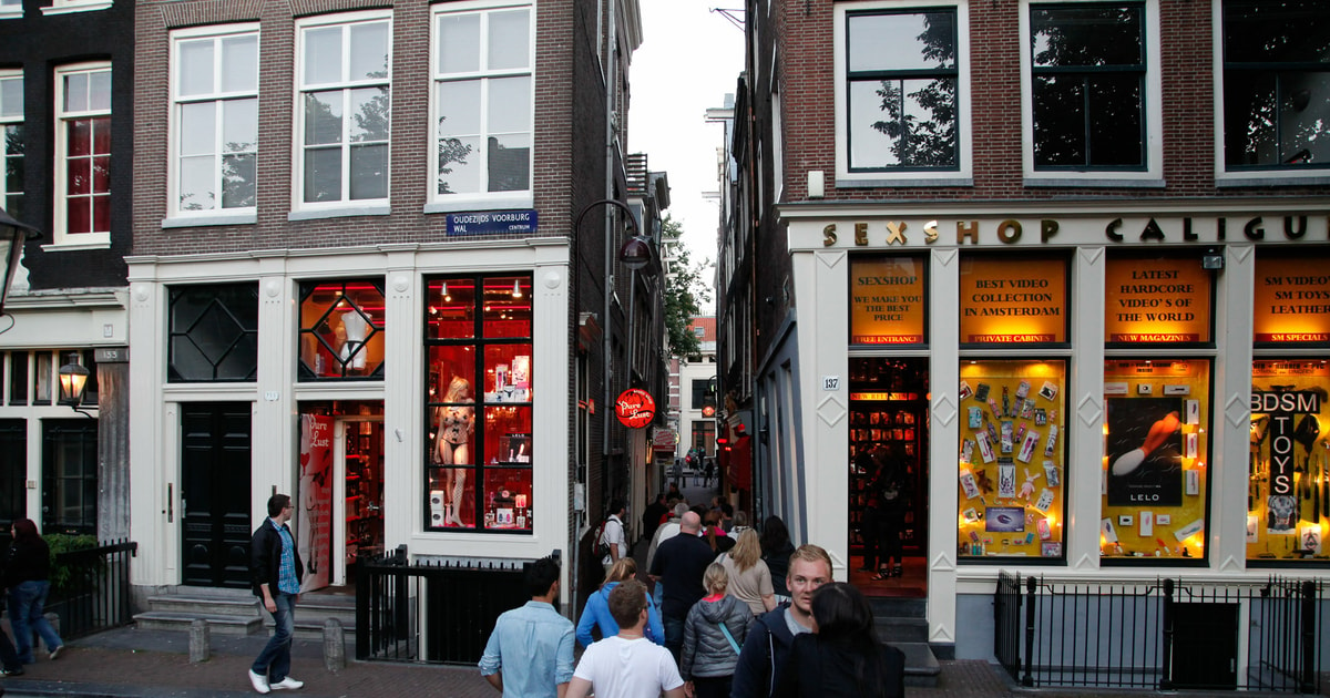 Amsterdam: Coffee Shop and Red Light District Walking Tour  GetYourGuide