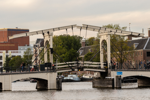 Amsterdam: Kanalkryssning på tyska med obegränsade drinkarGemensam kanalkryssning