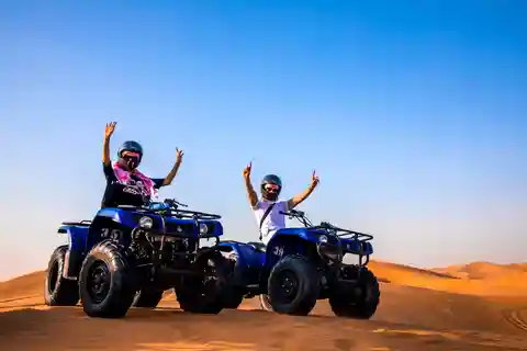 Dubai: Rote Dünen Quadbike, Dünenbuggy, Kamel & Erfrischungen