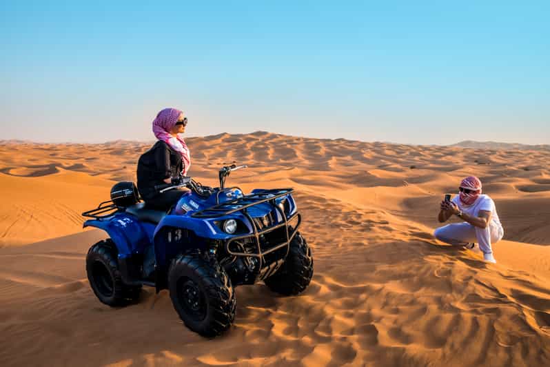 Dubai Red Dunes Quad Bike Ride GetYourGuide