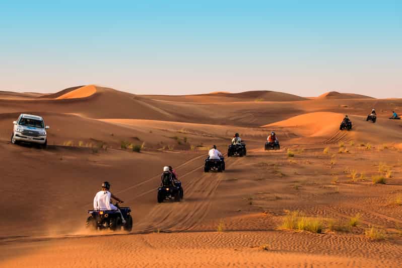 Dubai Red Dunes Quad Bike Ride GetYourGuide