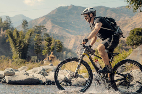 Pokhara: Sunrise, Mountain Biking, and Rafting Tour