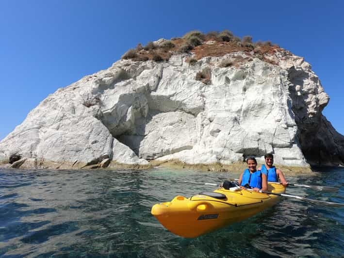 Santorini: Sea Caves Kayak Trip With Snorkeling And Picnic | GetYourGuide