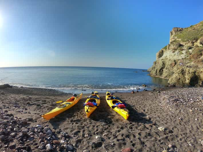 Santorini: Sea Caves Kayak Trip With Snorkeling And Picnic | GetYourGuide