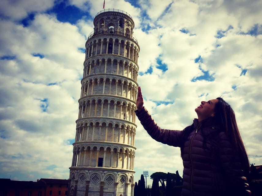 Phil's hugging a great big tower! - Picture of Pisa, Province