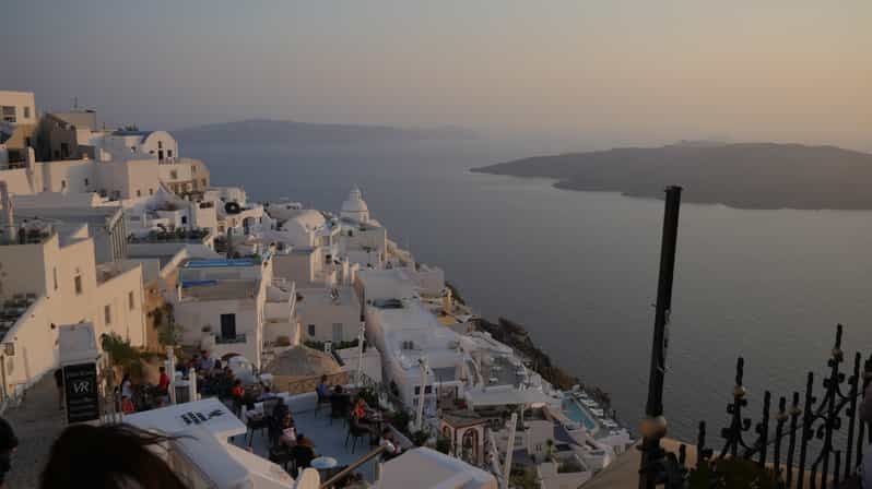 Fira: Walking Tour with Cable Car Ride | GetYourGuide