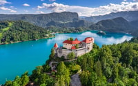 From Ljubljana, Postojna Cave, Predjama Castle and Lake Bled - Housity