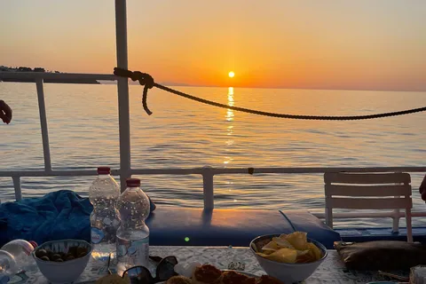 Cefalù: sunset coast tour with snorkeling and aperitif