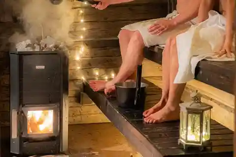 Rovaniemi: Excursión Privada a la Sauna y a Nadar en el Hielo con Aperitivos