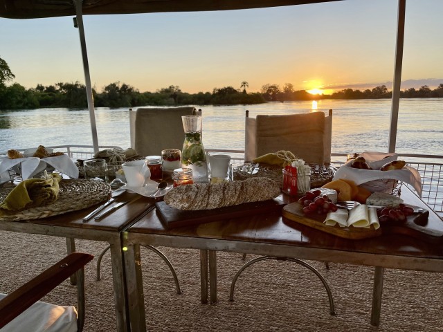 Visit Victoria Falls Private Sunrise Cruise with Breakfast in Zambezi River