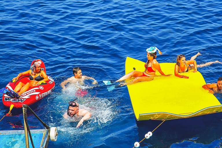 Ibiza: Rejs po plaży z paddleboardem, jedzeniem i napojamiIbiza: rejs po plażach, paddleboarding, przekąski i napoje