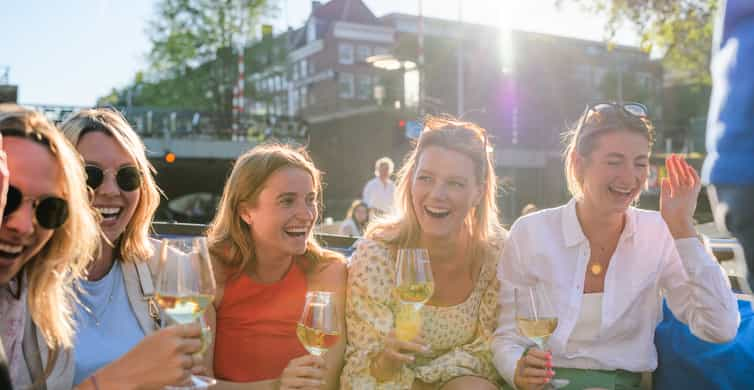 Amsterdam: Canal Booze Cruise with Unlimited Drinks | GetYourGuide