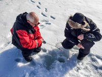 Levi, pesca en hielo por moto de nieve - Housity