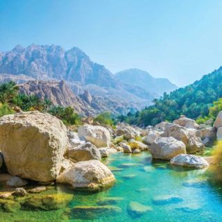 Muscat: Wadi Shab and Bimah Sinkhole Tour with Audio Guide