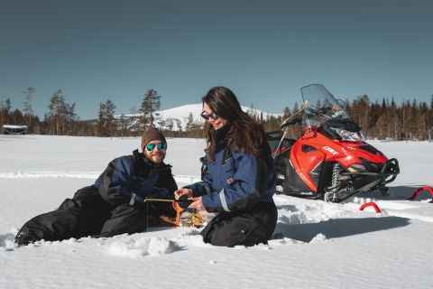 Levi: Snowmobile Safari with Ice Fishing and Outdoor Lunch