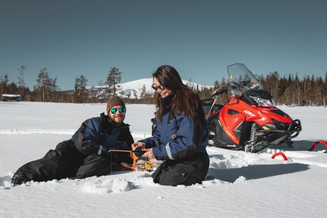 Visit Levi Snowmobile Safari with Ice Fishing and Outdoor Lunch in Levi, Finland