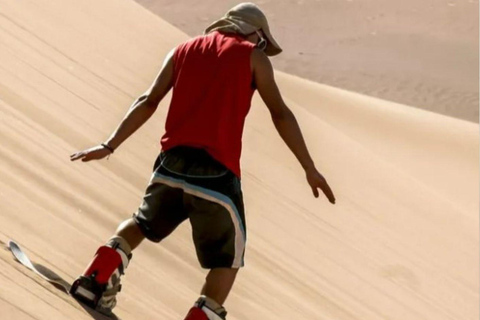 Doha: Safari nel deserto a basso costo, escursioni in cammello e sandboardingDoha: Safari nel deserto a basso costo, escursioni a dorso di cammello e sandboarding