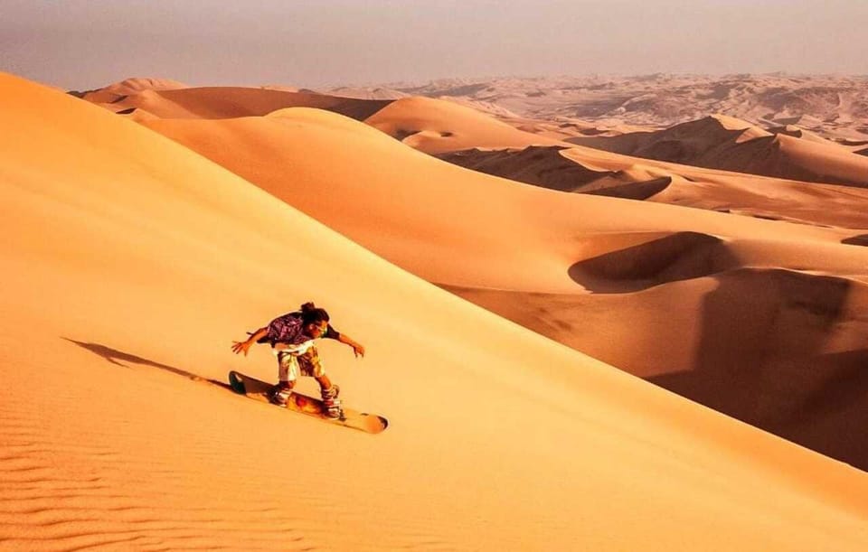 Doha: Desert Safari, Sandboarding, Camel Ride and Inland sea | GetYourGuide