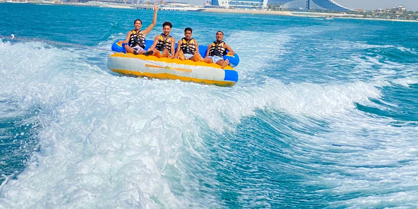 Dubai: Speedboat Tubing Around Burj Al Arab | GetYourGuide