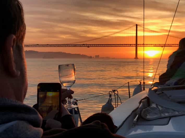 Lisbon Sunset Sailing Cruise with Wine GetYourGuide