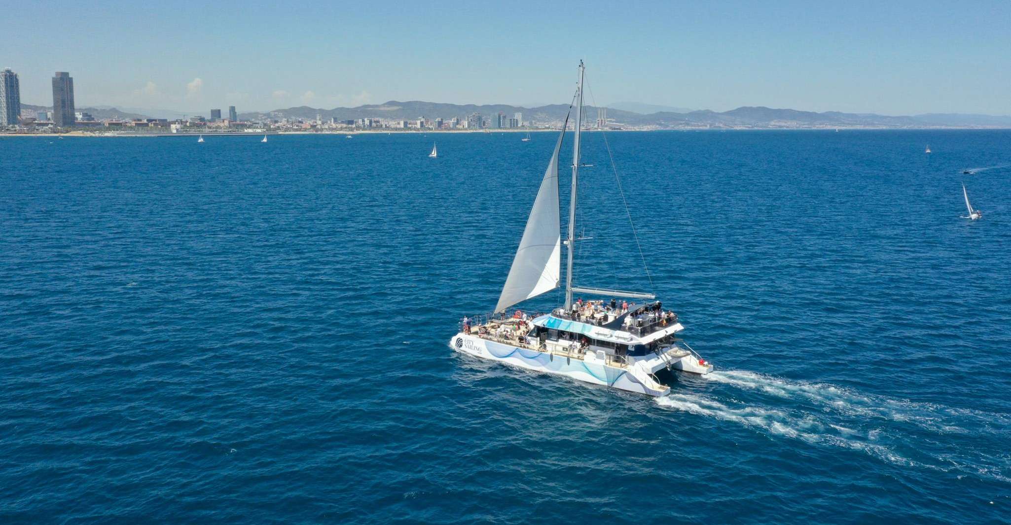 Barcelona: Daytime or Sunset Catamaran Cruise with Music photo 12