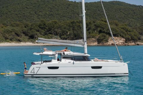 Mykonos: crociera in catamarano con pasto di 3 portate e trasferimenti