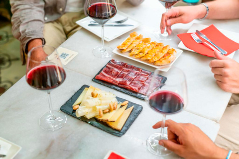 Tapas, Friends & Wine: Walking Food Tour with 3 Local Bars Barcelona: Tapas and Wine Tour Through 3 Districts