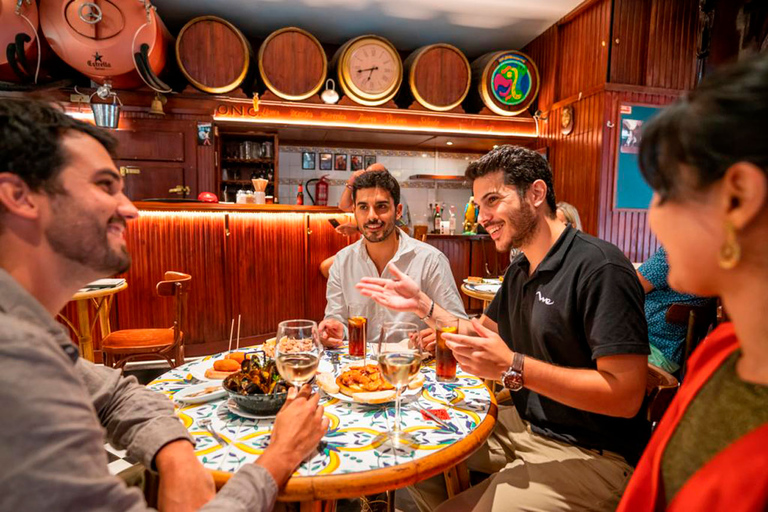 Tapas, Friends & Wine: Walking Food Tour with 3 Local Bars Barcelona: Tapas and Wine Tour Through 3 Districts